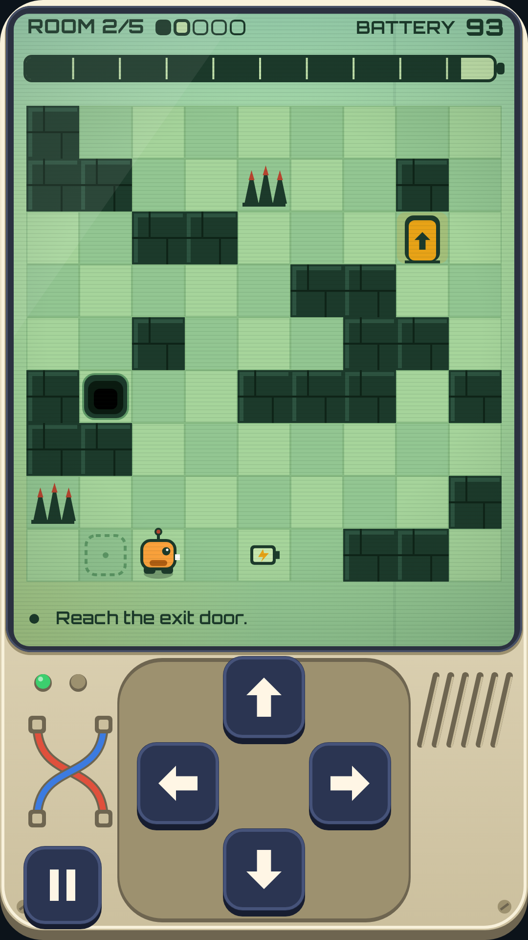 A path room with walls, spikes and a pit between the robot and the exit door.
